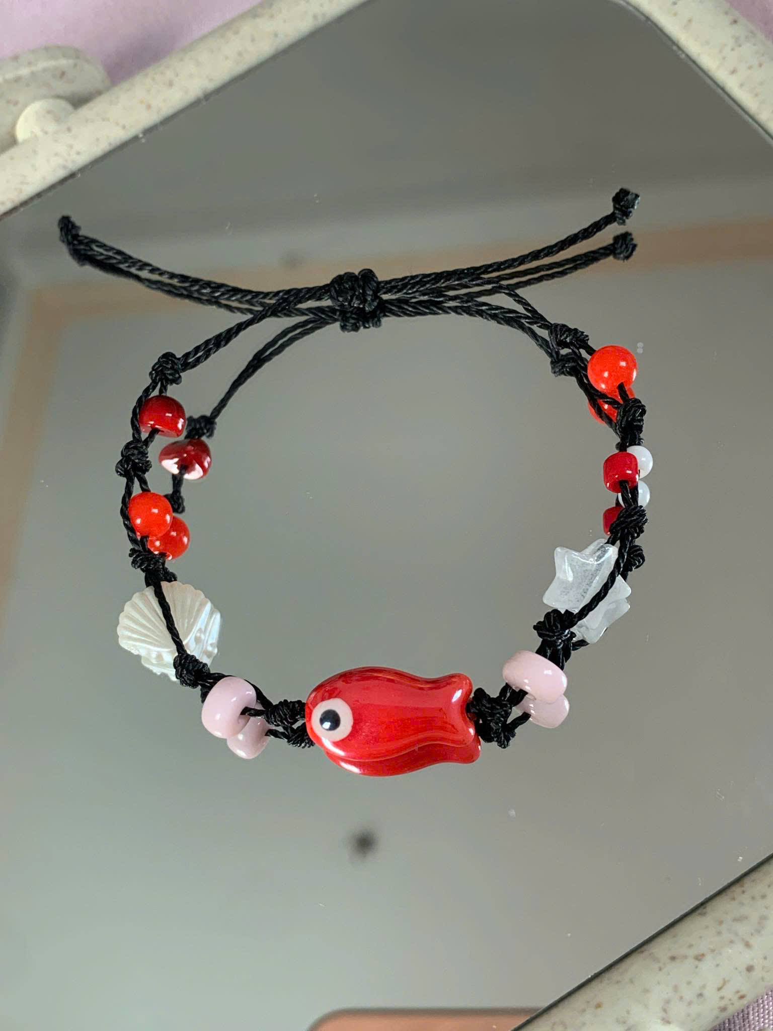 1.3 vòng tay dây rút cá gốm đỏ